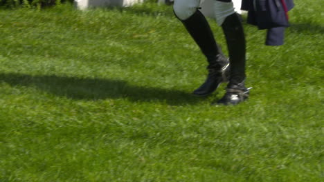 a rider doing a course walk before a show jumping competition