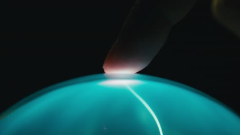 human finger interacts with artificial intelligence