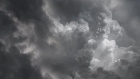 stormy dark skies of thunderstorms and dark clouds