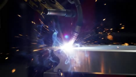 dynamic welding process captured: a close-up of sparks and light generated from advanced fabrication techniques