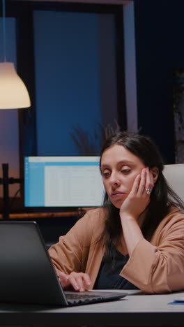 vertical video exhausted workaholic executive manager woman typing financial strategy