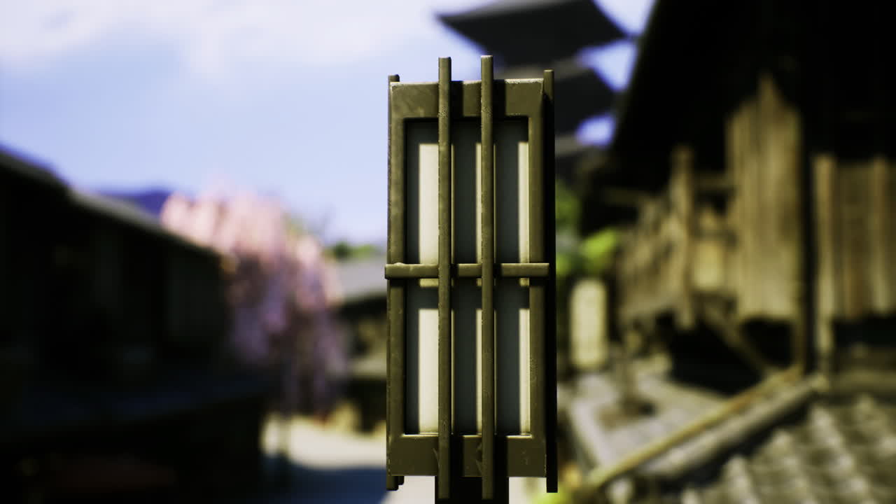 Traditional lantern guiding paths in a serene japanese village during daytime