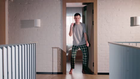 man dancing in pajamas