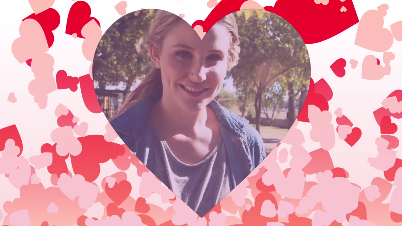 공원에서 행복한 백인 어머니와 딸의 심장과 심장 프레임의 애니메이션