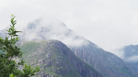 view of misty mountain in sifjord, norway - close up