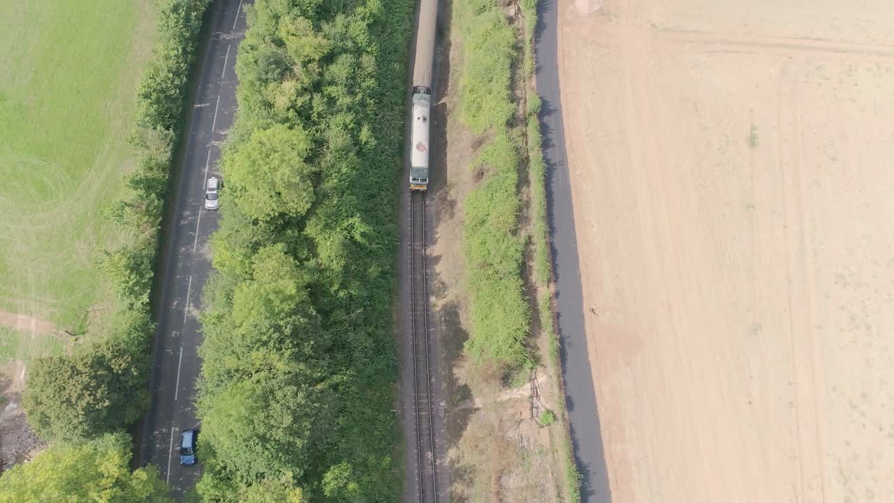 Aerial view of a train traveling through the countryside