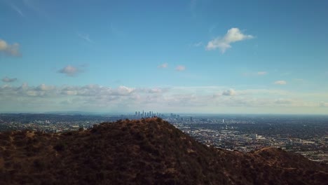 aerial shot flying over hollywood hill to reveal downtown los angeles