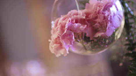 close-up of beautiful flowers in vase on table