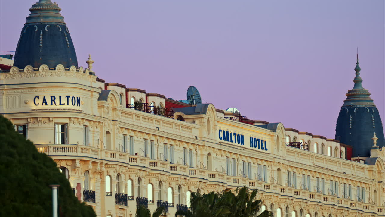 Cannes, France - January 15, 2025: View of the Carlton Hotel on the coast in the evening