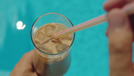 iced coffee by the pool