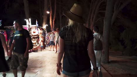 july 30, 2024 bol, croatia - night scene of famous torurist resort bol on island brac, croatia mediterranean coastal adriatic city of bol. tourists zlatni rat beach walkway to the city