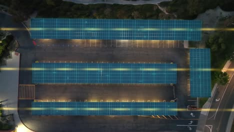 células solares que utilizan la energía generada para cargar automóviles y para iluminar un dosel de estacionamiento, antena de superposición gráfica vfx