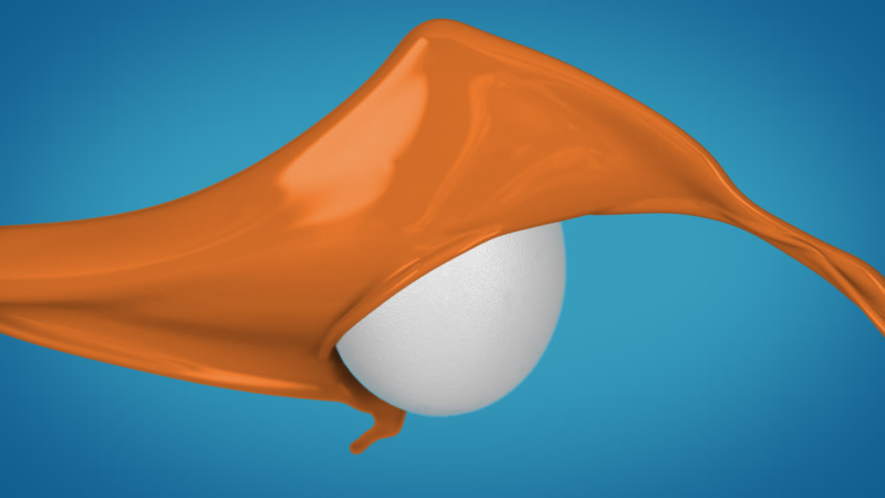 Easter Egg Painted Orange By Splashing With Dye, Slow Motion, Blue Background