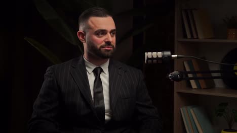 businessman in a suit giving an interview