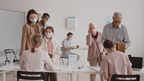 patients standing in lines for registration