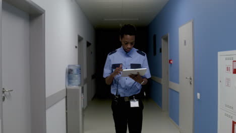 Man-in-uniform-working-on-the-corridor