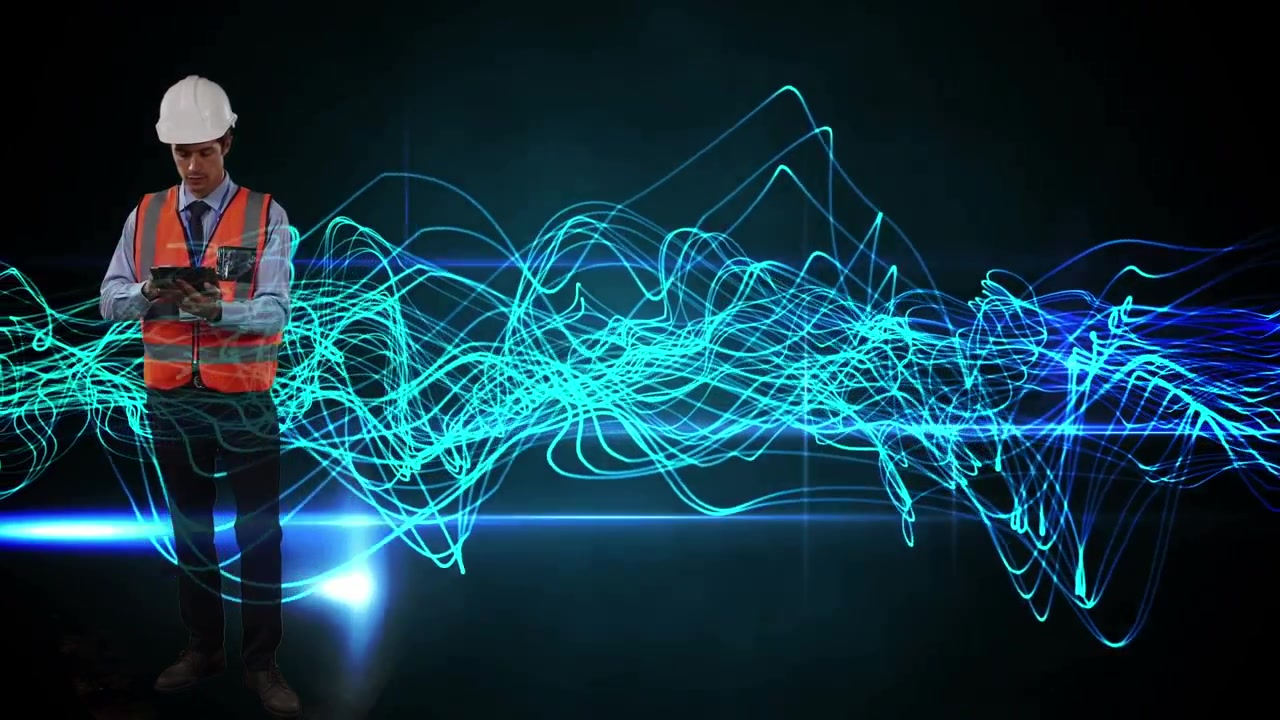 Animation af lysspor over en kaukasisk mandlig medarbejder, der bruger en tablet.