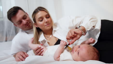happy family with their newborn baby