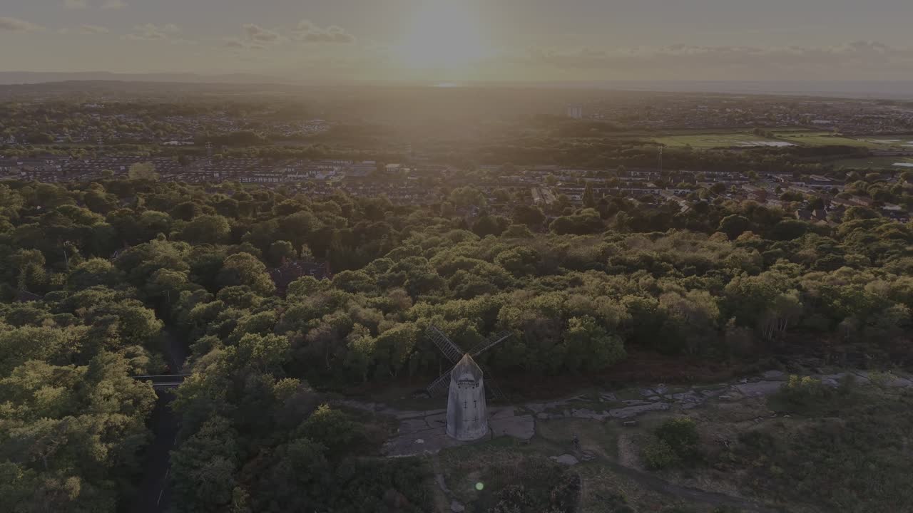 Stunning Bidston Hill and Windmill, slow clockwise sunset pan on a lovely autumnal afternoon, Wirral, UK