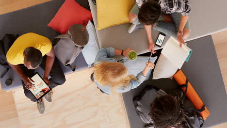 people working and collaborating in a modern co-working space.