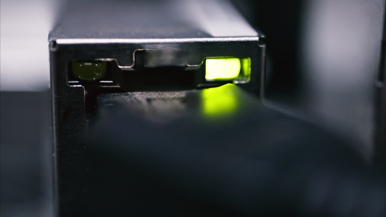 Close up of a server with flashing colourful lights in a data center