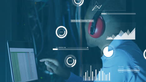 animation of diagrams and data processing over biracial male worker in server room