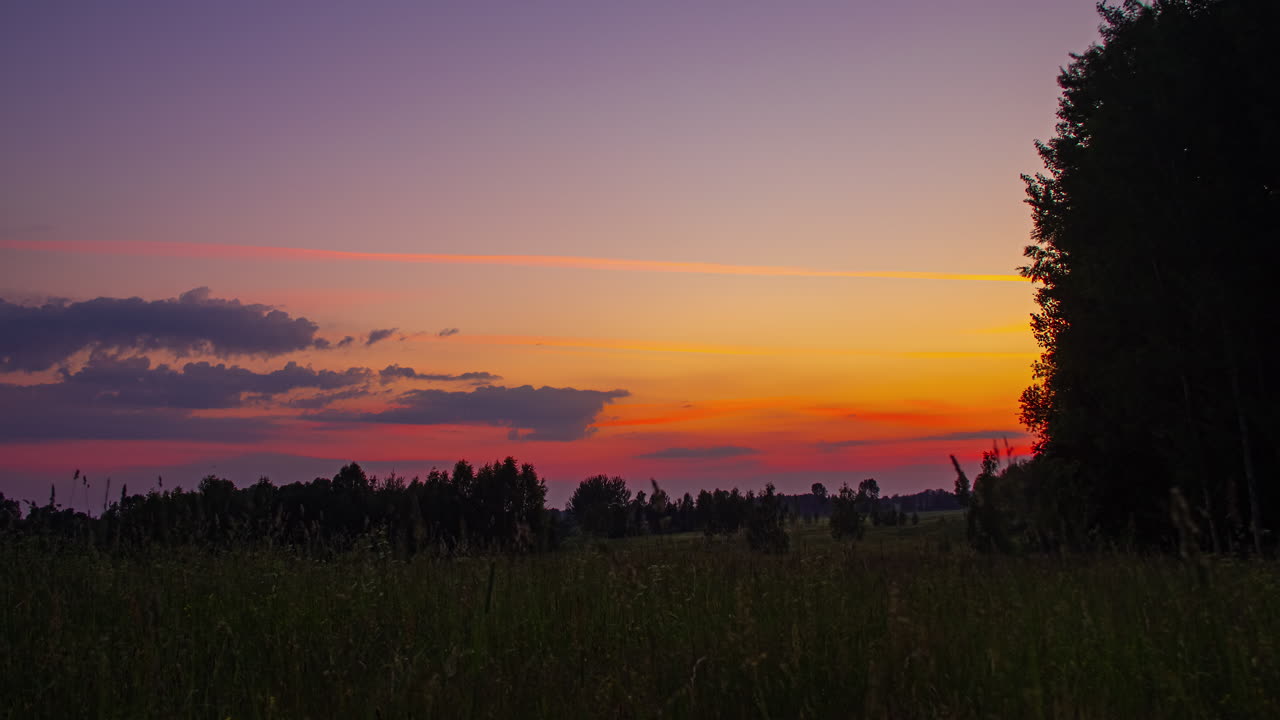 Behold the awe-inspiring spectacle of nature captured in its vibrant glory through a masterfully crafted time-lapse shot