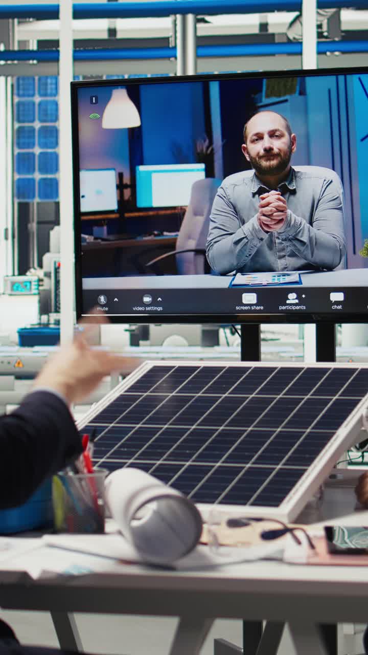 Vertical video Experts optimize factory equipment energy output during videocall meeting