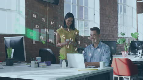 Animation-of-illuminating-pattern-on-keyboard-over-diverse-coworkers-discussing-in-office