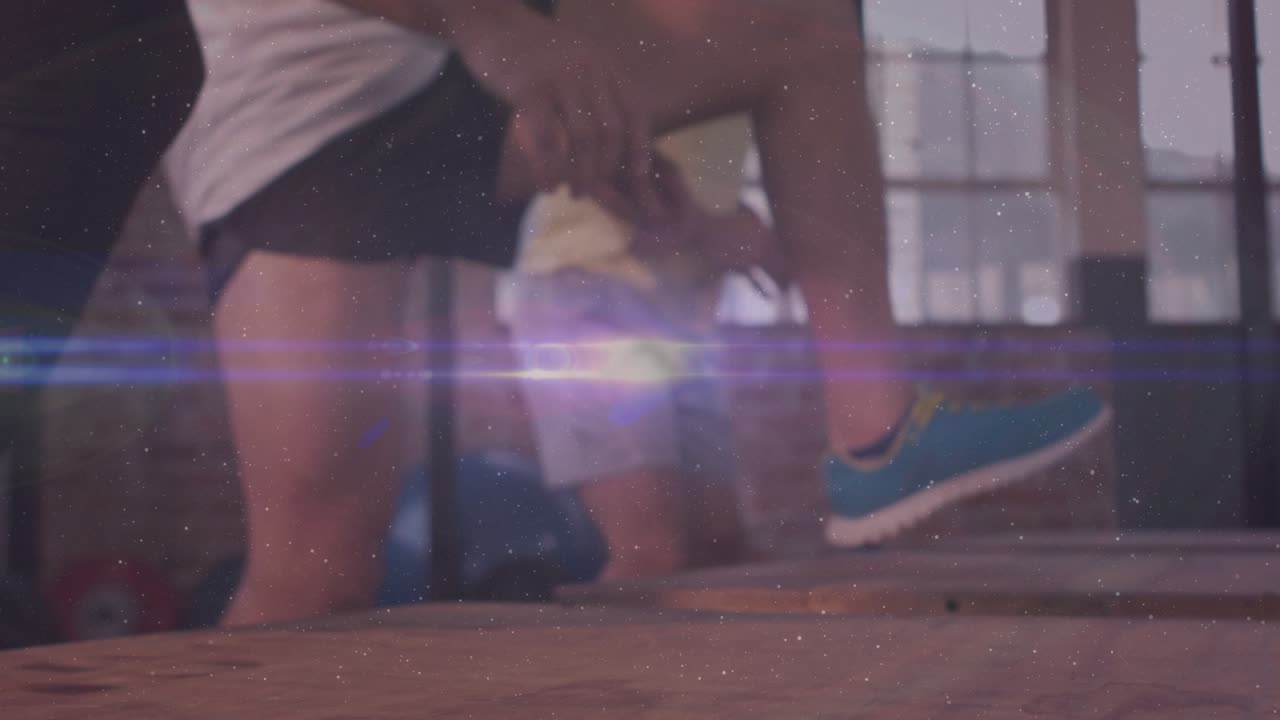 Front sneakers on step starting planted pose group doing step-ups and lunges, flare marking fitness