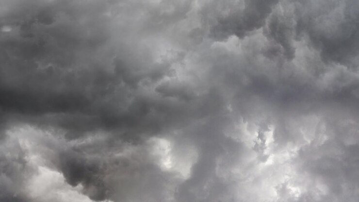 thunderstorm background in the sky and heavy clouds