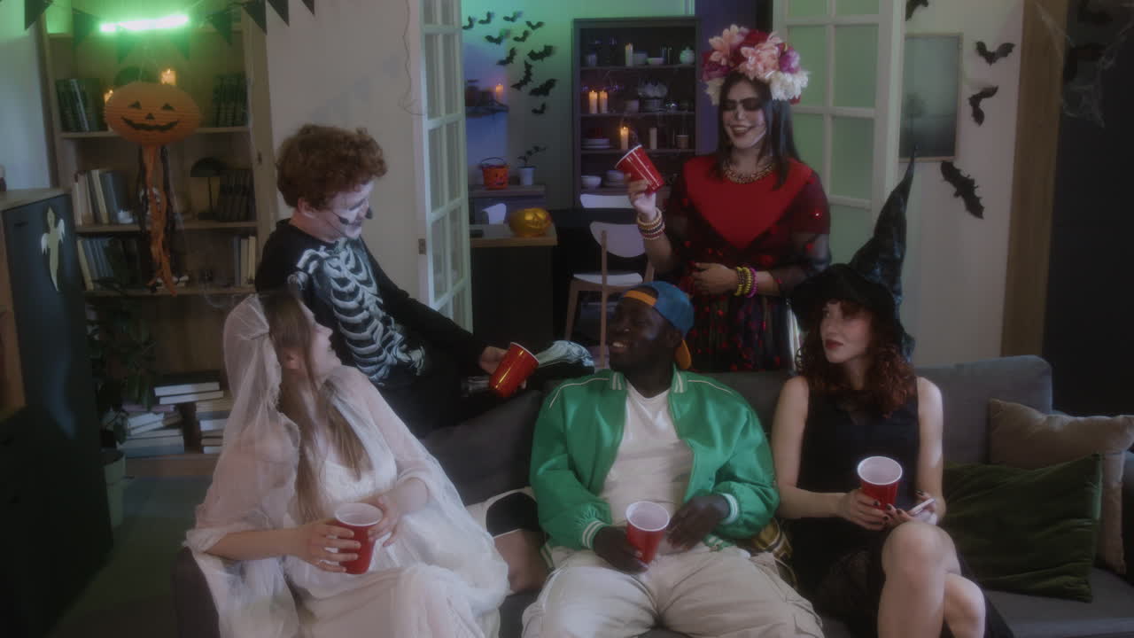 Halloween Party with Friends in Costumes