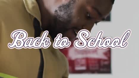 Animation-of-back-to-school-text-over-african-american-male-teacher