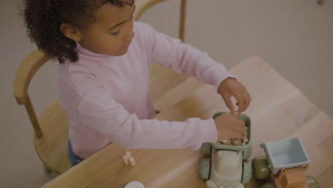 little girl in the playroom