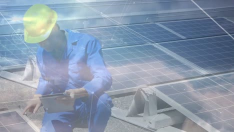 animation of network of connections over solar panels and caucasian male engineer