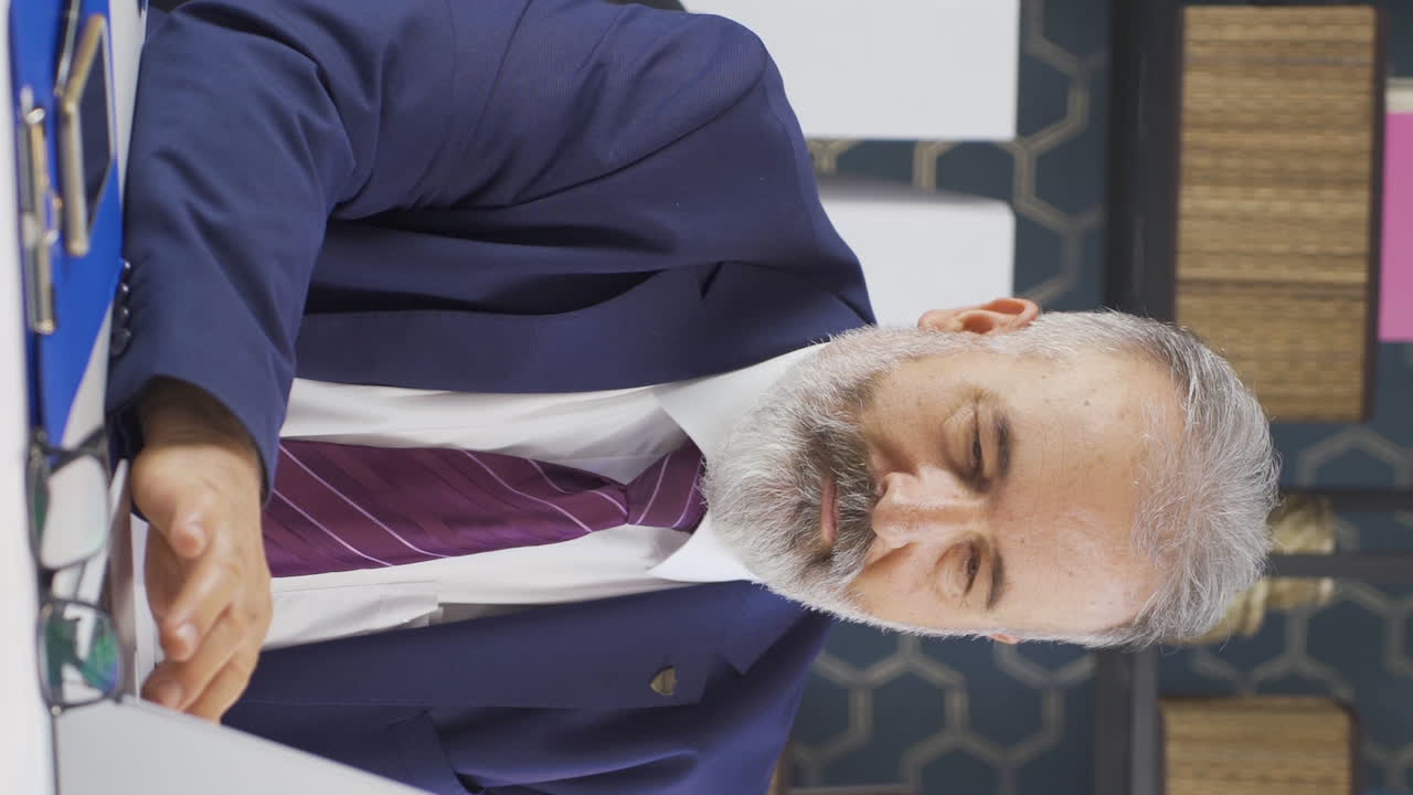 Vertical video of Brave and confident old businessman.