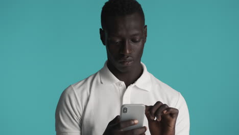 african american man on blue background.