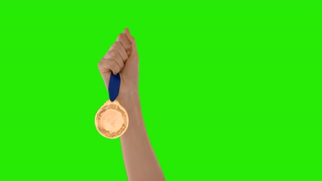 hands throwing a medal