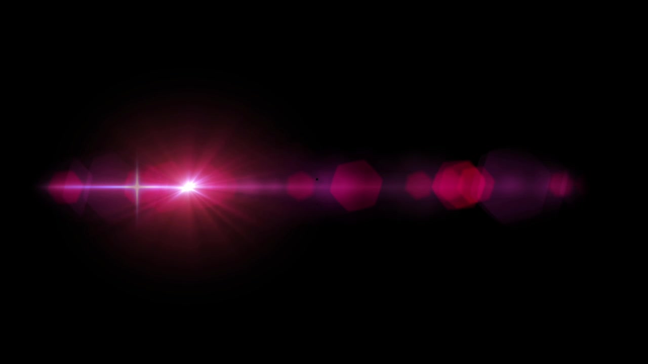 Realistic pink light lens flare isolate on black background.