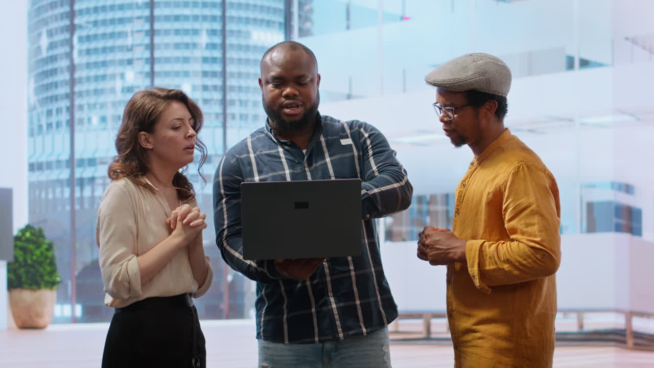 Business professionals strategizing an office relocation during a tour