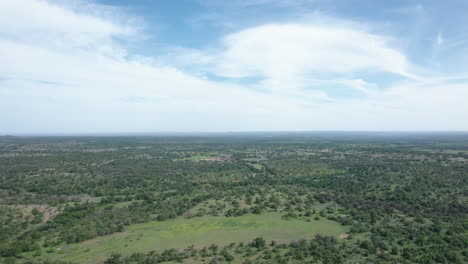 wide aerial view of rural ranch land in the texas hill country