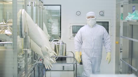 scientist working in a cleanroom environment