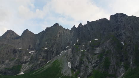 imposing trollveggen troll wall with rugged peaks in rauma, norway