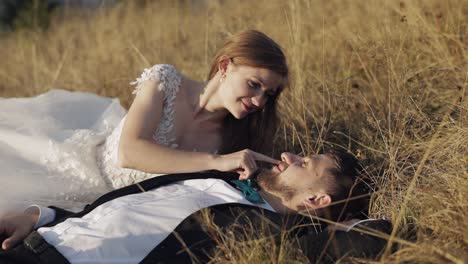 a happy bride and groom in a field