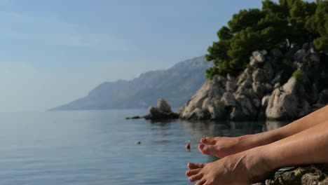 woman enjoying vacation by the sea with mediterranean sea view, close up