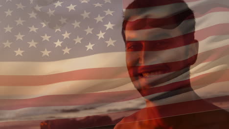 animación de la bandera de los ee.uu. sobre un hombre biracial feliz