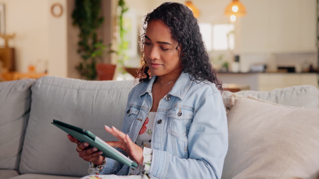Woman Relaxing on Couch with Tablet