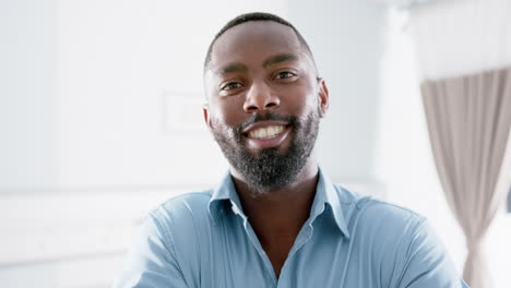 portrait of happy african american man in hospital, slow motion