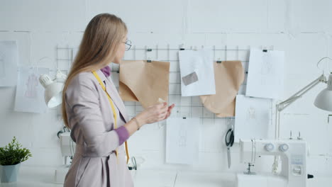 Fashion Designer Working in Studio