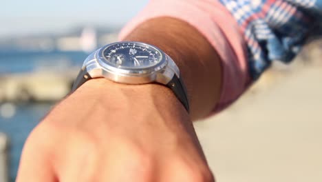 Young-Man-Waiting-And-Checking-Time-On-His-Watch-Close-Up-Shoot